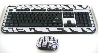 crystals Includes keyboard, mouse, and usb dongle. Keyboard and mouse