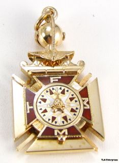 bidding consideration is this fine, vintage Knights of Columbus fob