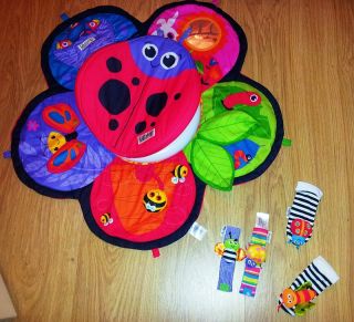 Lamaze Spin and Explore Tummy Time Prop Play Garden Gym Mat Wrist Feet