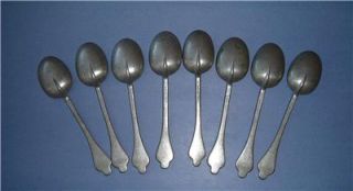 set of 8 antique pewter soup spoons are 7 1/2 long, marked Lange Mott