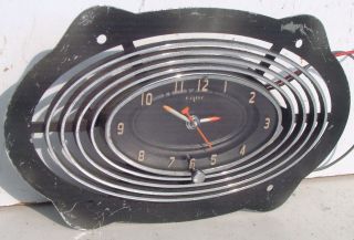 This is an original 1956 Olds clock. No cut wires.