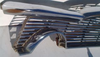 This is an original 1956 Packard Clipper grill and moldings shown.