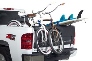 Carries bikes over tailgate   front wheels hang outside your truck