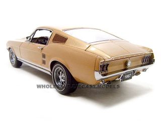 Brand new 118 scale diecast model of 1967 Ford Mustang GT390 Gold die