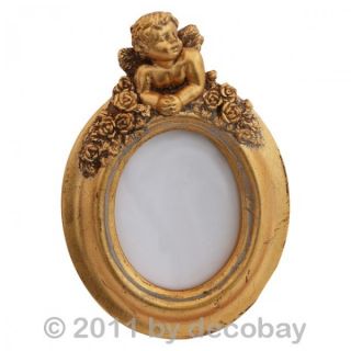 Photo Rahmen in Oval und Gold mit einem wartenden Engel am Kopf. Edler