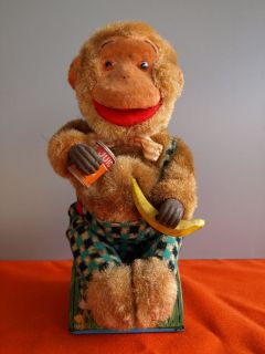 Battery Toys Picnic Monkey Blechspielzeug essender Affe