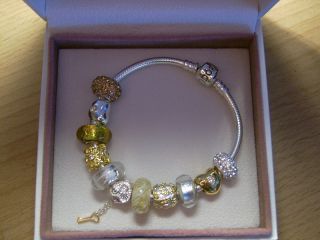 Original Pandora Armband mit 11 Beads gold/silber