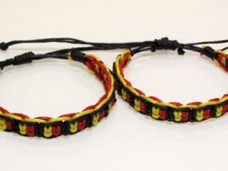 2x EM Armbänder schwarz rot gelb/gold Freundschaftsarmbänder Armband
